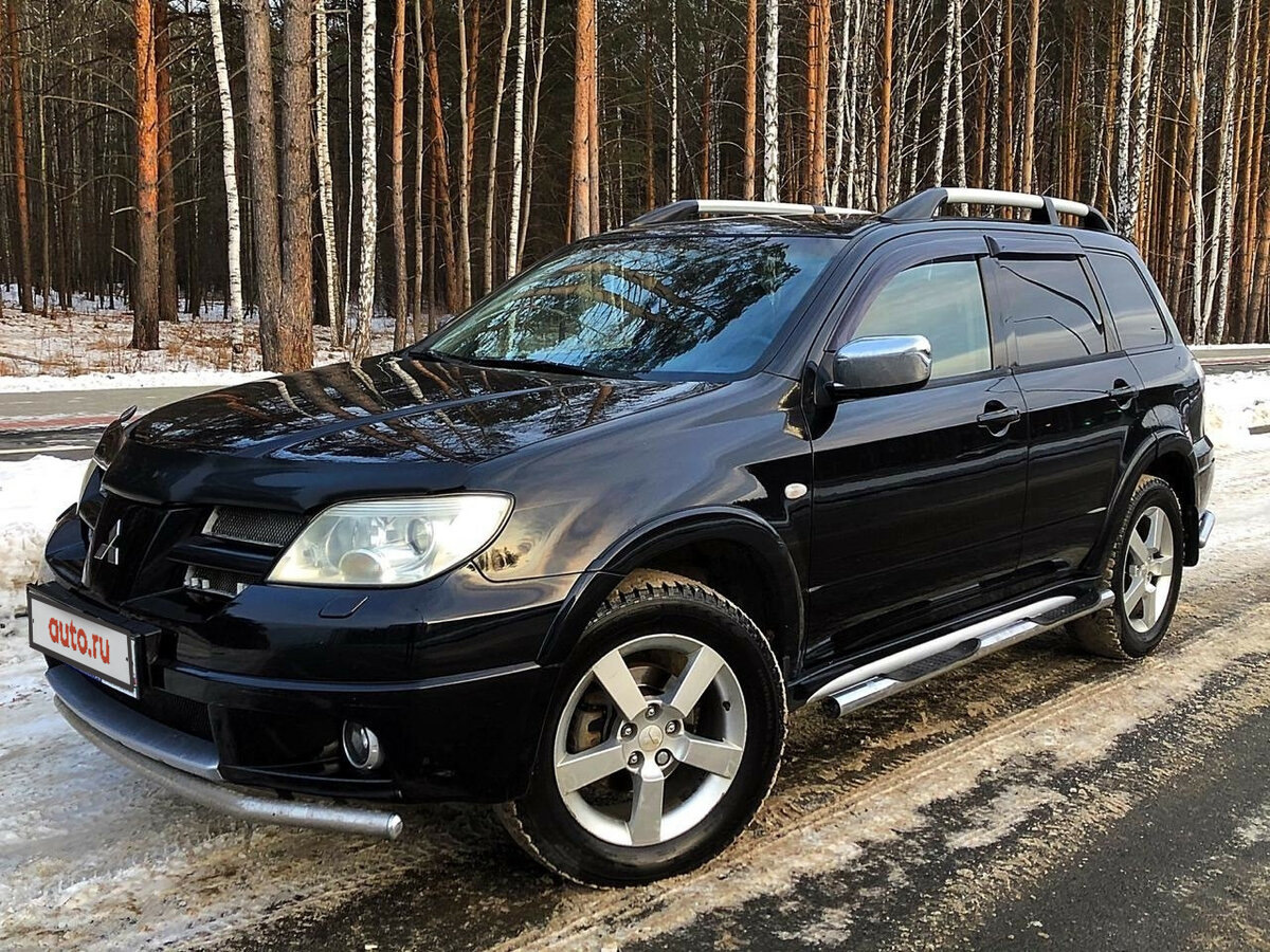 Mitsubishi Outlander (1G) 2.4 бензиновый 2007 | 2.4 на акпп цвет черный на  DRIVE2