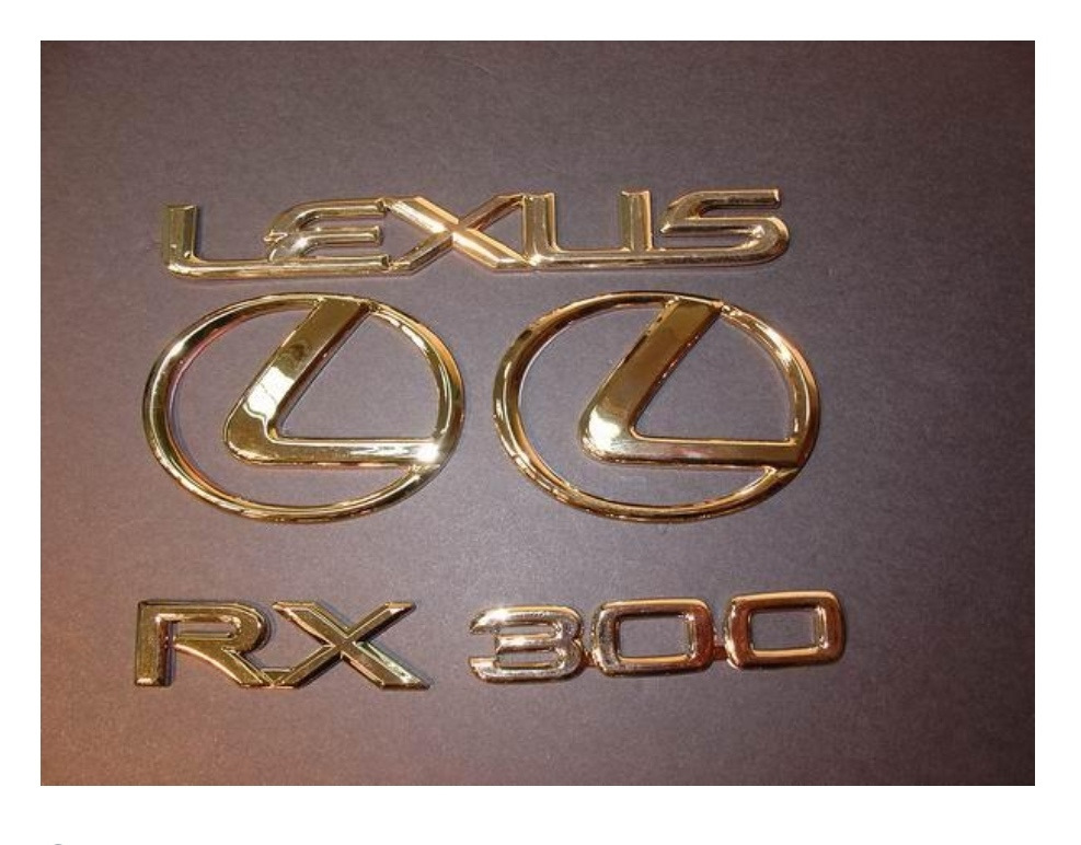 Что значит golden. Rx300 Lexus шильдики. Шильдик Лексус рх300. Золотые шильдики Тойота. Надпись Лексус.