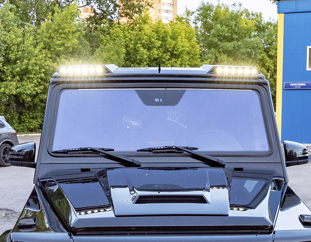Стекла на гелик. Козырек Гелендваген 463. Козырек с ходовыми огнями g63. Козырек Брабус Гелик 463. G-class w463 козырек ДХО.